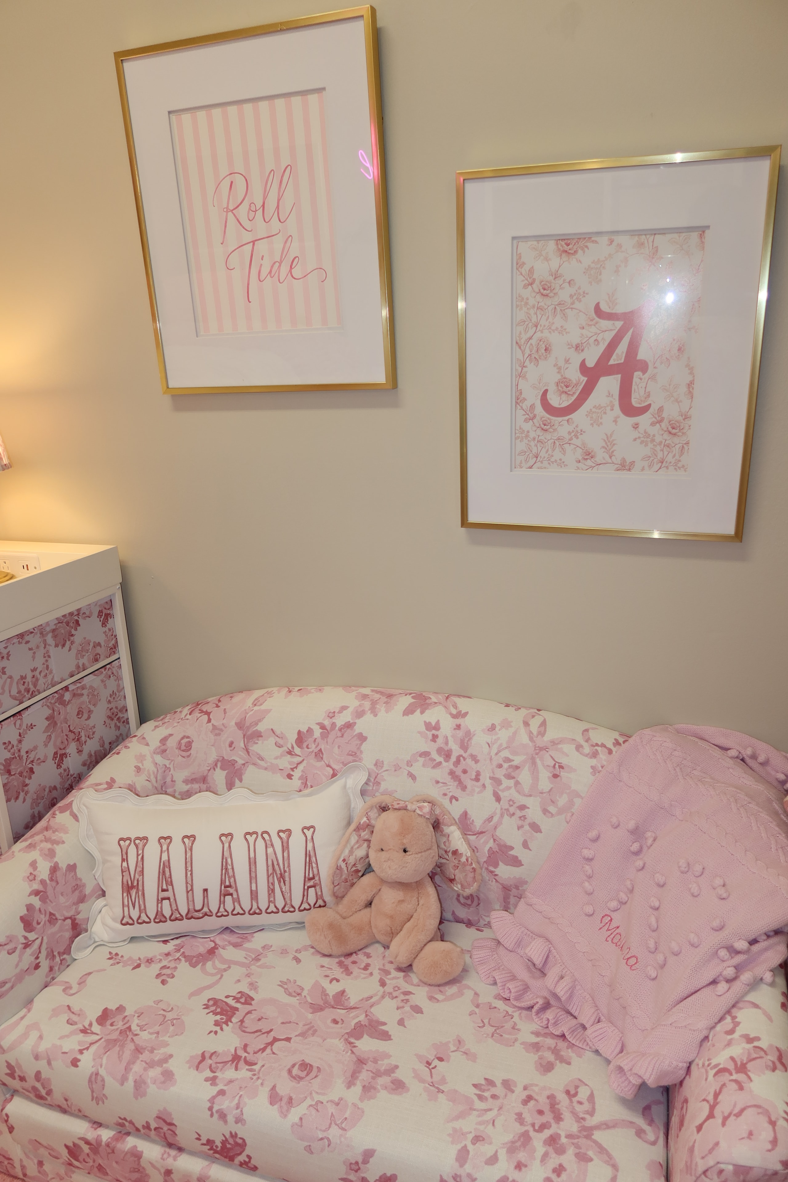 Malaina name pillow on pink floral round chair
