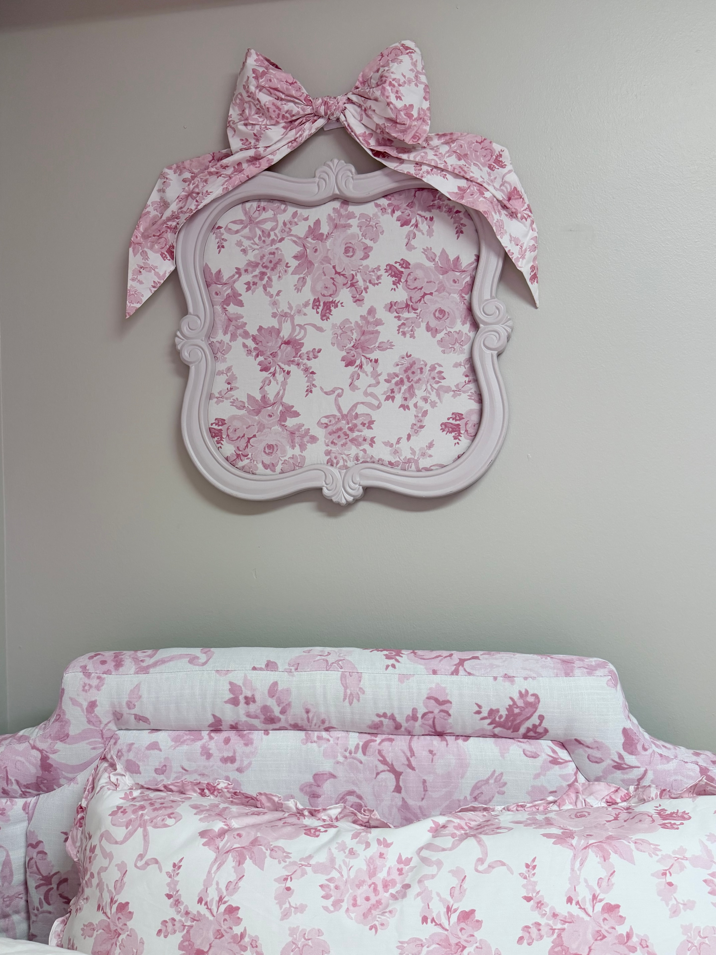 Ornate pink frame accessory detail